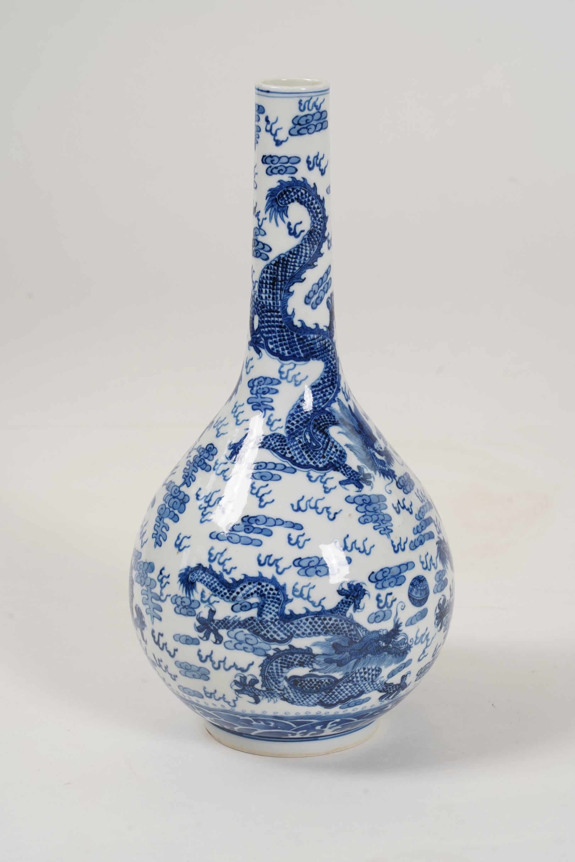 A Chinese blue and white 'dragon' bottle vase, 19th/20th century
